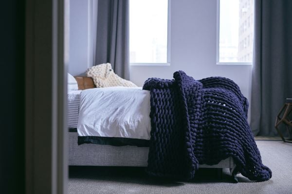 Bed with a blanket Unsplash
