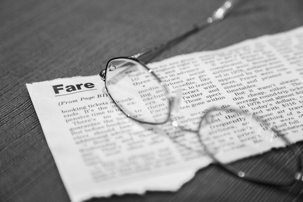 Glasses and newspaper