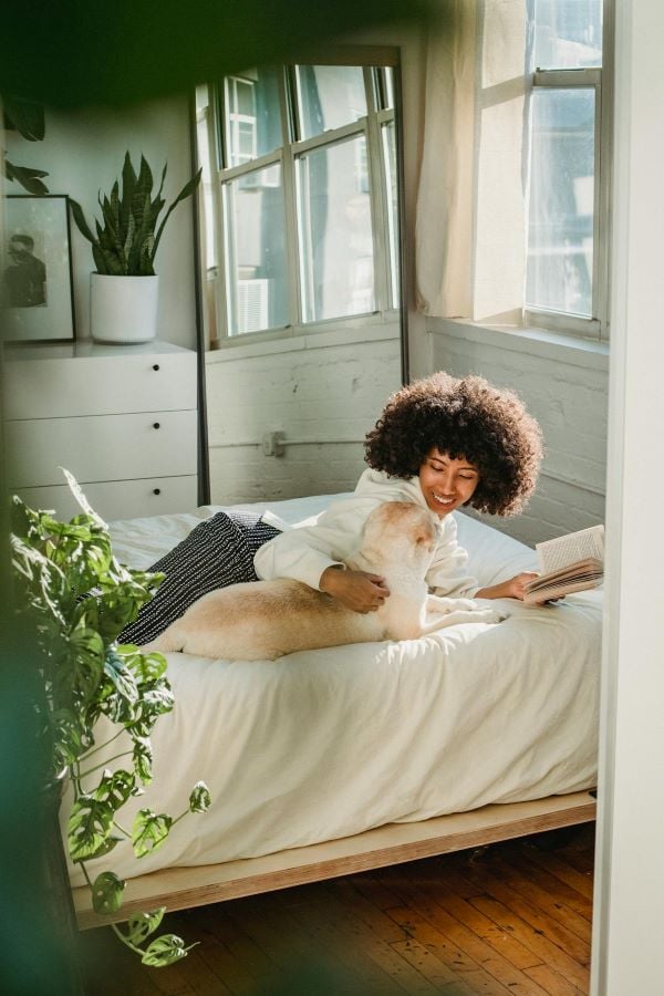 Woman with dog 600 Pexels