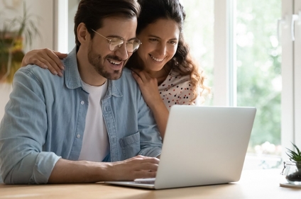 Happy couple on computer, Happy Homebuyers